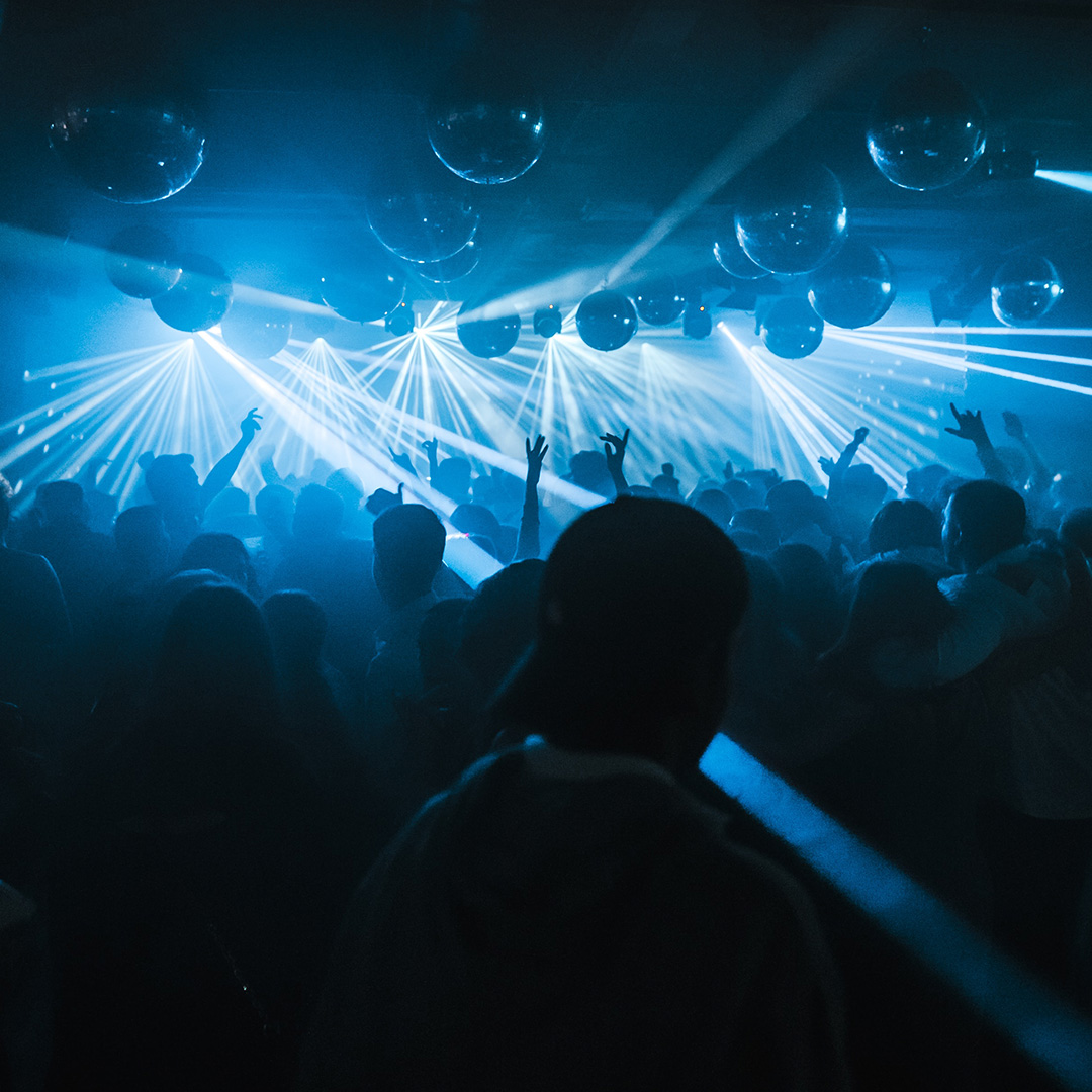 A party with live music and a blue light show